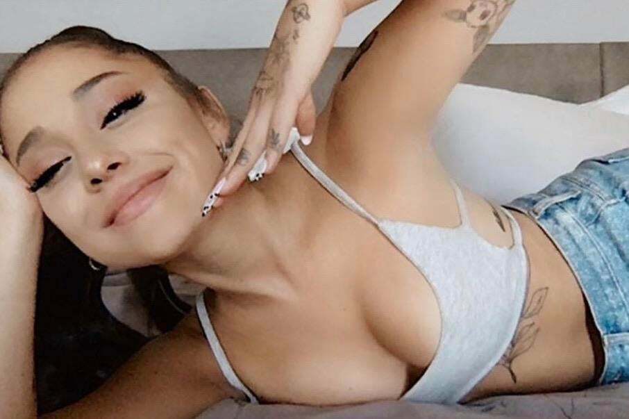 Ariana Grande showing you where she wants you to blow your load after prone-boning her