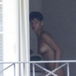 Rihanna fully naked by the window