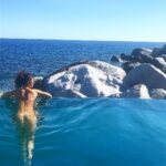 Sarah Hyland skinny dipping on vacation