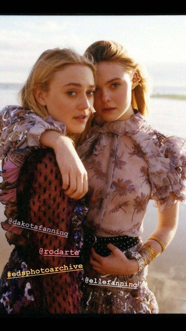 See through top on Elle Fanning as she poses with Dakota Fanning