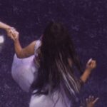 Ariana Grande's ass peeking out