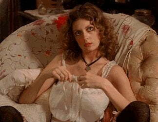 Susan Sarandon playing with her plots in Pretty Baby