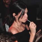 Kendall Jenner and a lollipop. Let your imagination do the rest.