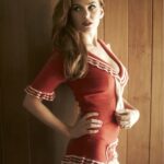 Isla Fisher - she's a hot redhead, her nip is hard, that might be enough for me to consider it as NSFW