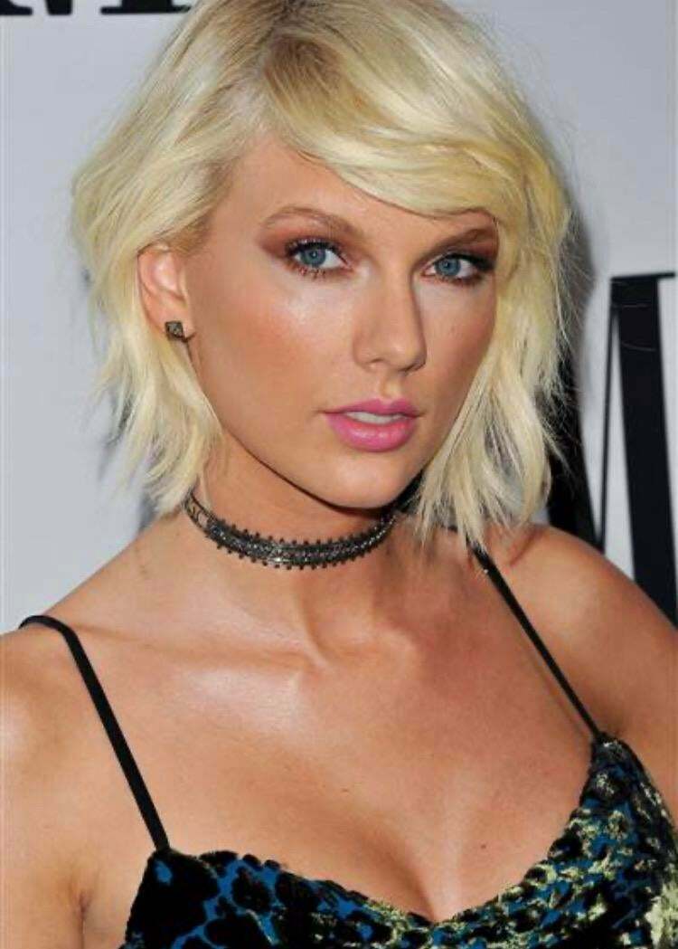 Taylor Swift looks perfect with this haircut, but would look more perfect with a cock in her mouth.