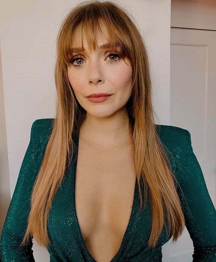 Elizabeth Olsen is just asking for a titty fuck wearing that.