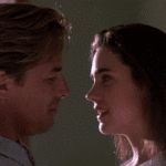 Jennifer Connelly kisses Don Johnson in "The hot spot"