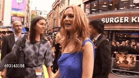 Heather Graham's rock hard nipples catch the eye of a red carpet cameraman