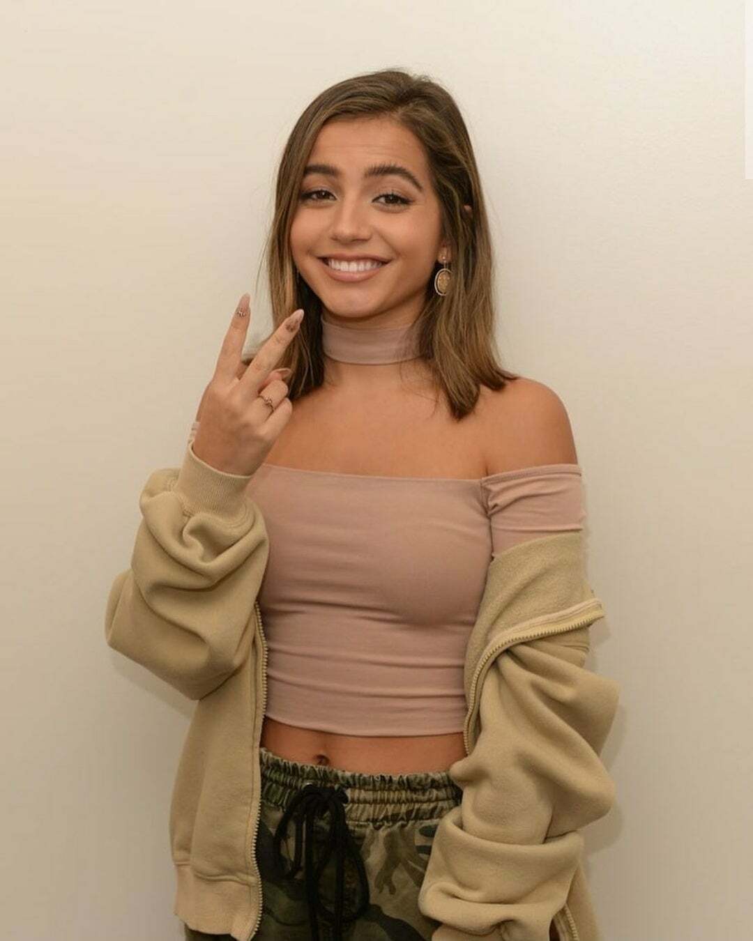Isabela Moner giving out that V sign hinting she wants someone to eat out her teen pussy.