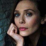 Elizabeth Olsen has a smile you want to protect but also fuck until her stomach is full of cum