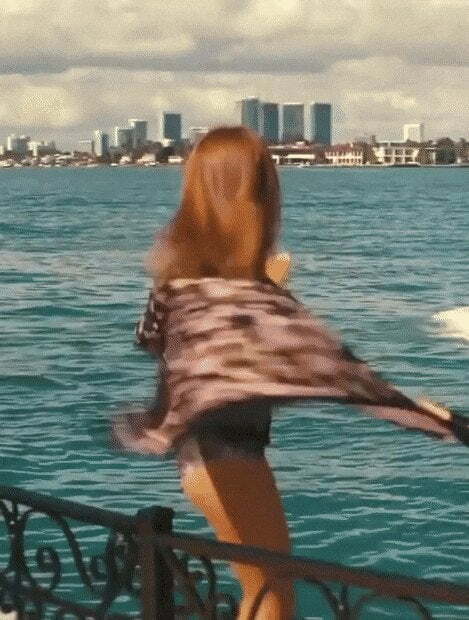 Isla Fisher flashing you a peek...