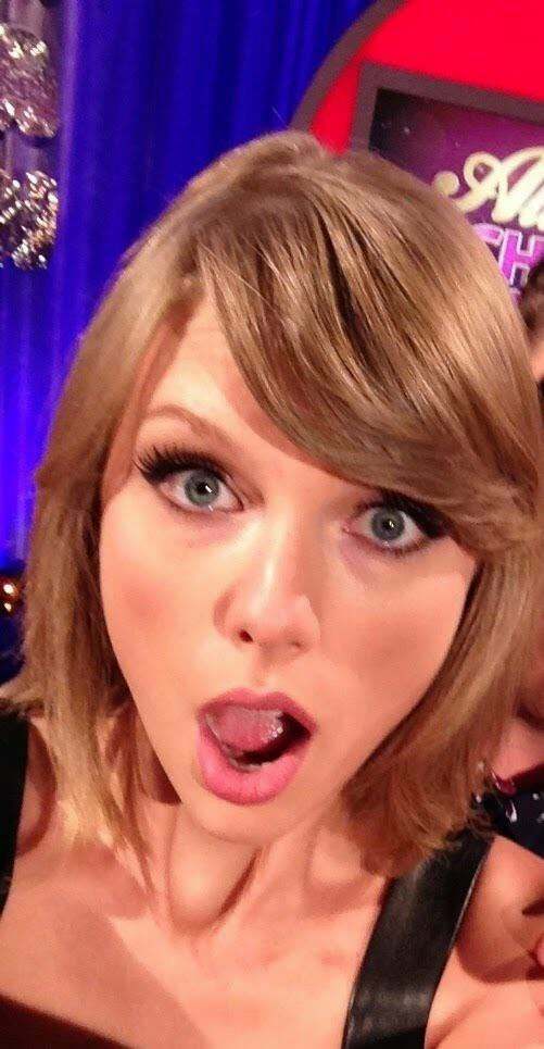 Waking up and looking down to see Taylor Swift make this face as she reaches down your pants