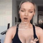 Dove Cameron showing off her workout cleavage