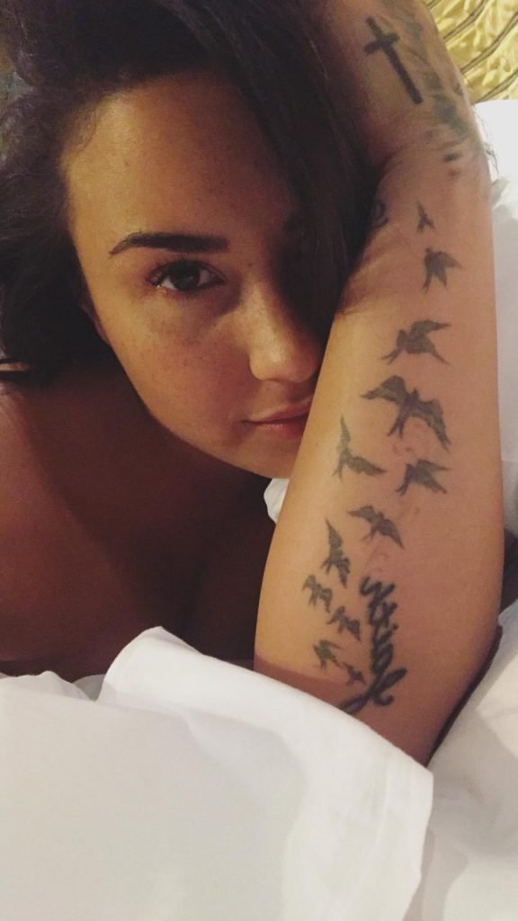 Demi Lovato Flashes A Nipple In Bed (4 Pics + Gif)