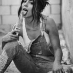 Chloe Bennet's mouth needs something better than just a bottle of Corona beer, isn't it?