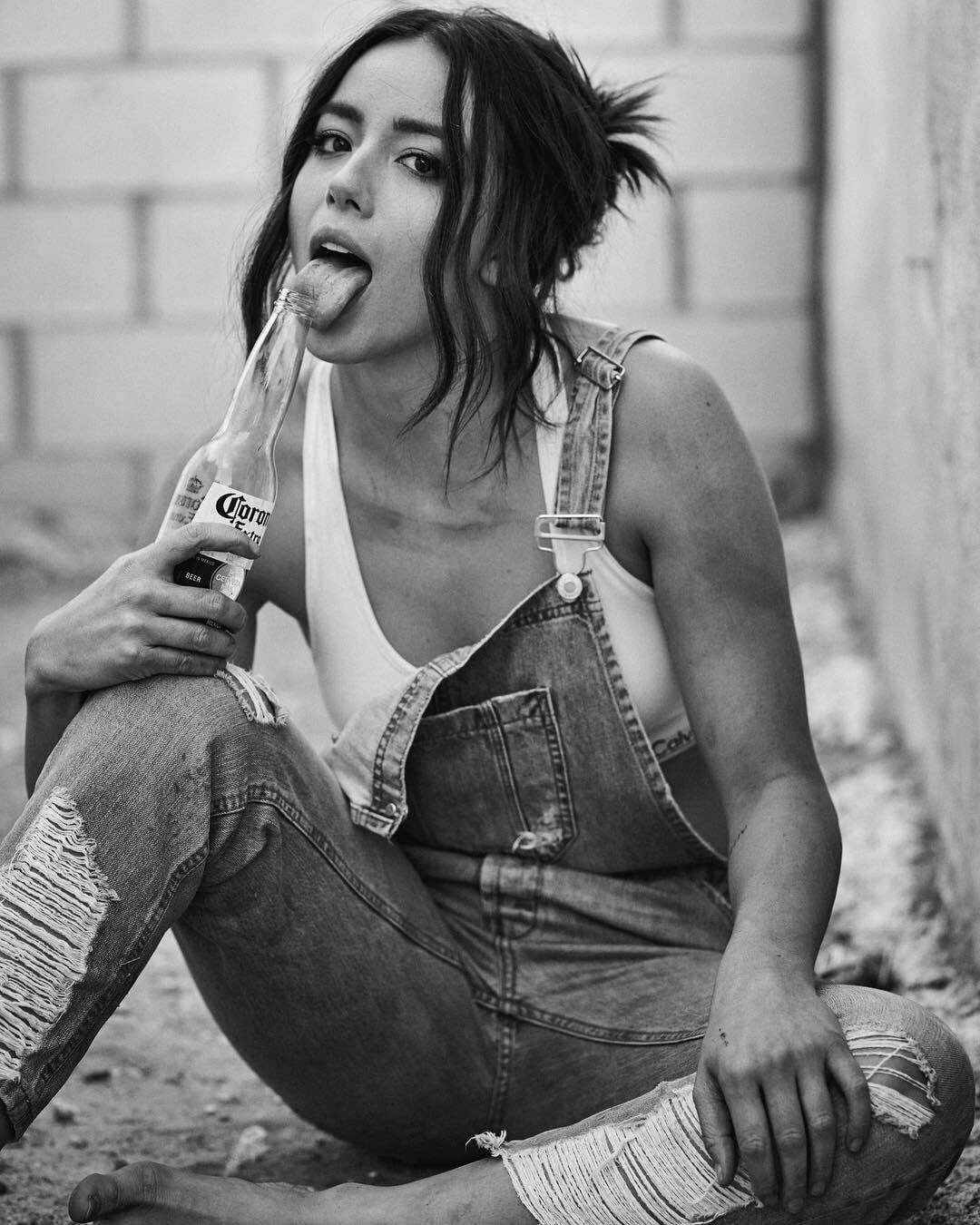 Chloe Bennet's mouth needs something better than just a bottle of Corona beer, isn't it?