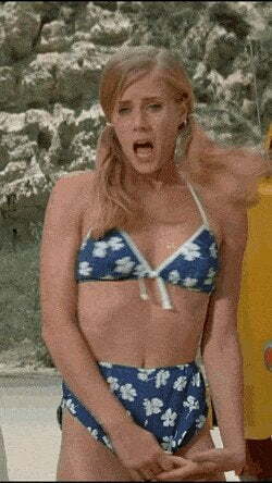 Amy Adams trying to cover her modesty in 'Psycho Beach Party' (2000)