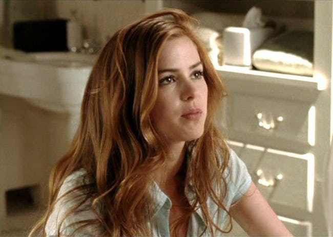Isla Fisher as that crazy redhead from Wedding Crashers Who