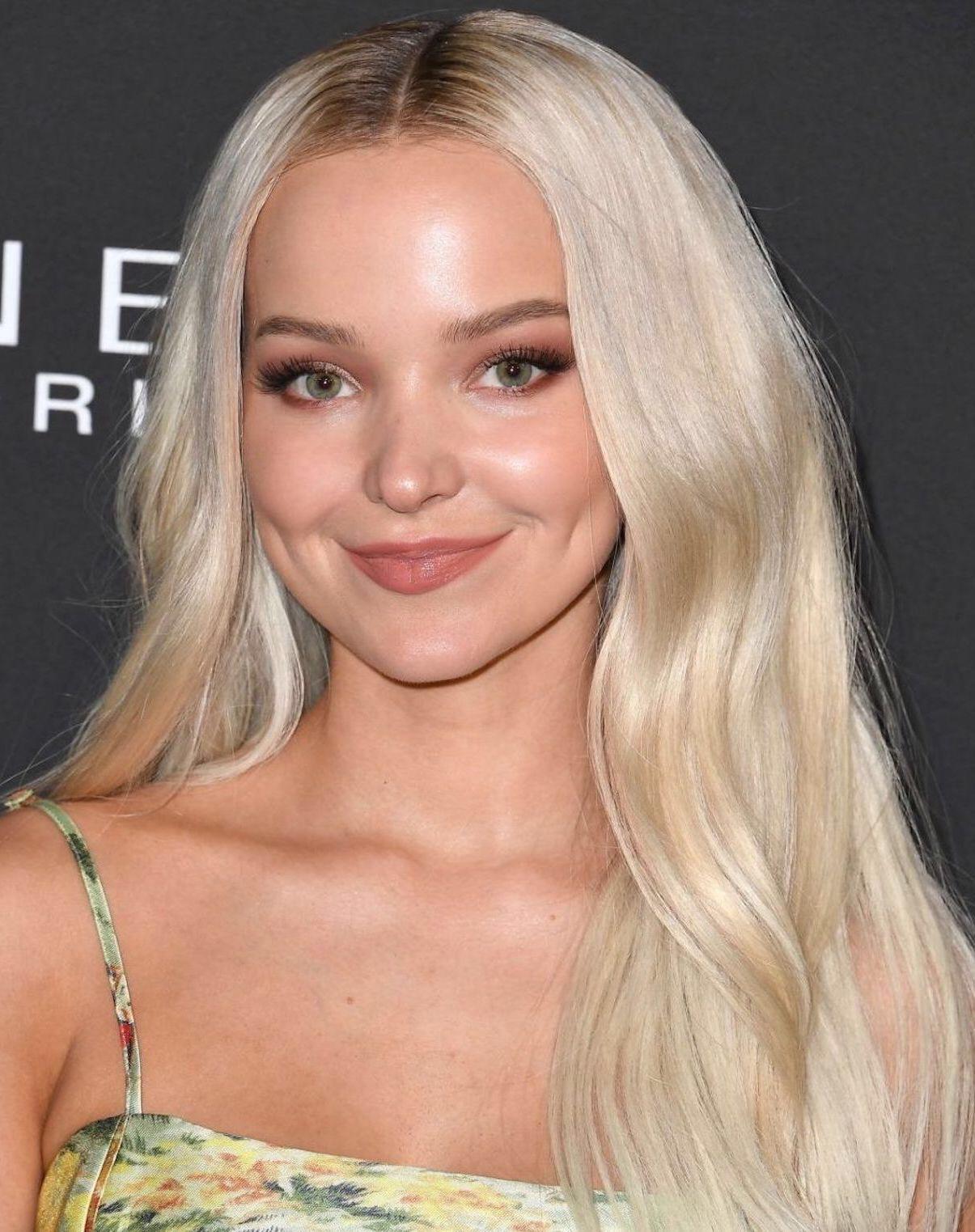 Dove Cameron needs a good facial on that pretty face