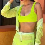 Victoria Justice in a yellow...or is it some kind of green?...bikini