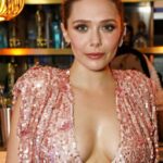 The gorgeous Elizabeth Olsen showing her weapons