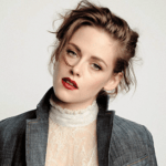 With the help of her hands and mouth, how should we cover Kristen Stewart's beautiful face with our cum? Should we all line up and take turns busting our loads one by one? Or should we completely surround her and give her a full out bukkake? Explain.