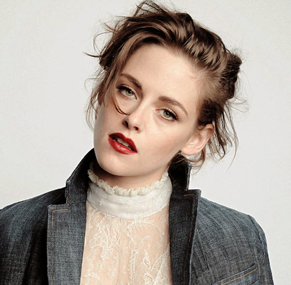 With the help of her hands and mouth, how should we cover Kristen Stewart's beautiful face with our cum? Should we all line up and take turns busting our loads one by one? Or should we completely surround her and give her a full out bukkake? Explain.