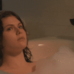 Alexandra Daddario getting out of the tub