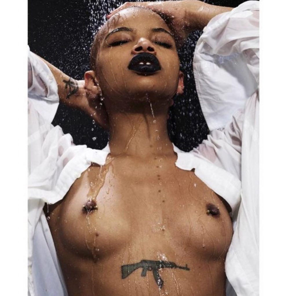 Slick Woods Topless & Sexy (10 Photos)