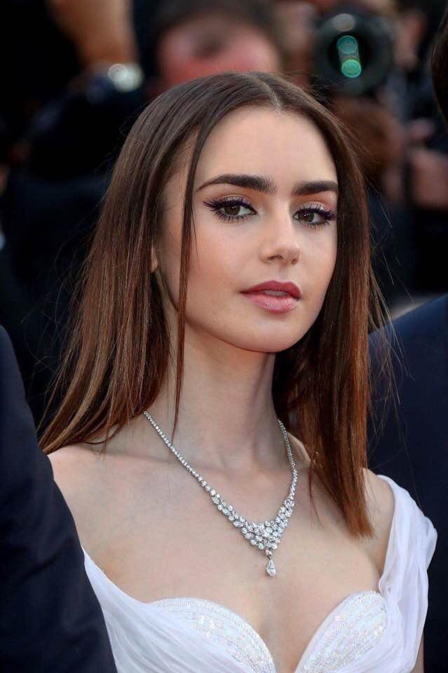 Lily Collins a cute petite babe