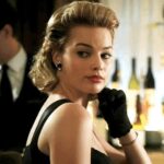 Margot Robbie waiting for someone to pick her up at the bar...