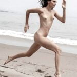 Kendall Jenner running on the beach