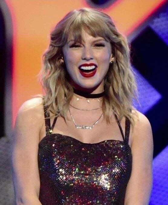 Imagine Taylor Swift on her knees, your fist tightly gripping her blonde hair as you ram your hard cock deeper and deeper into her throat, until you shoot a gooey throatpie straight into her belly...