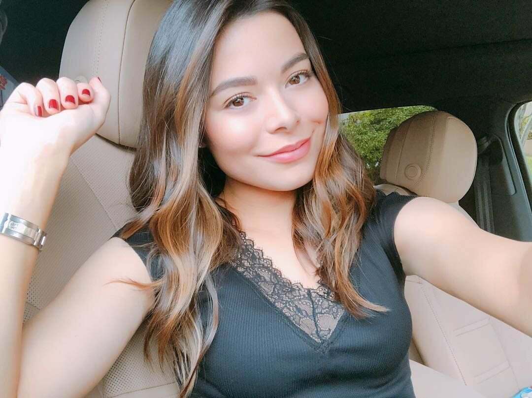 Miranda Cosgrove sitting her car and waiting for some hard cocks. How would you fuck her if you would find her?