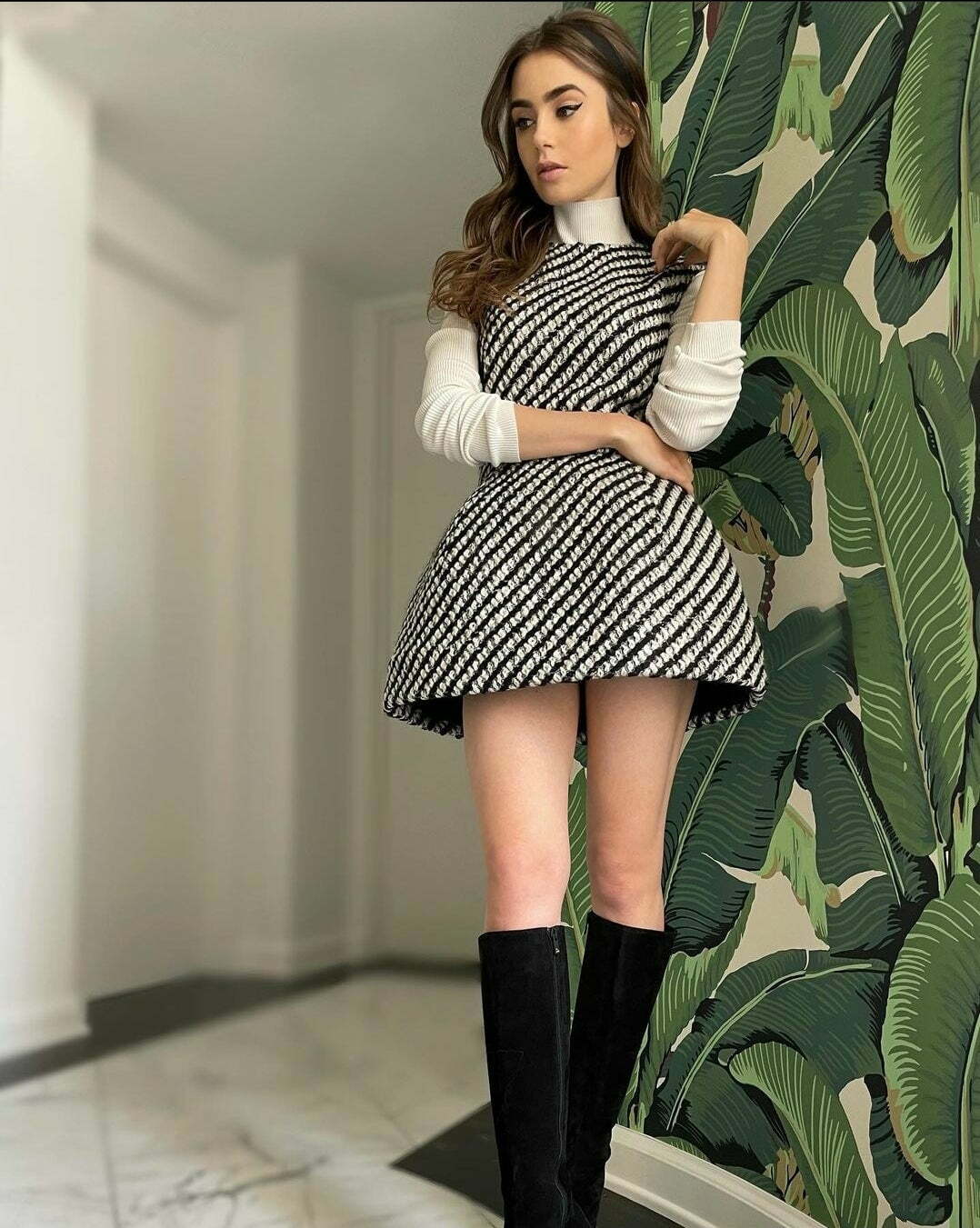 The legs on Lily Collins
