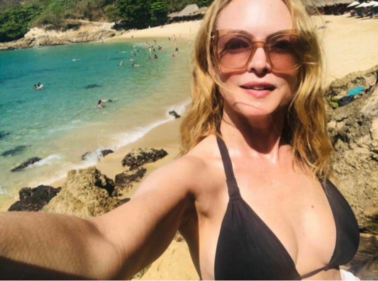 Heather Graham showing off her mature body