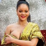 Rihanna just loves to show off her big round breasts!