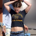 Imagine Hilary Duff showing her midriff and belly button while doing her hair in the middle of the street, how would you feel?