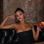 Selena Gomez's Boobs about to burst out that top
