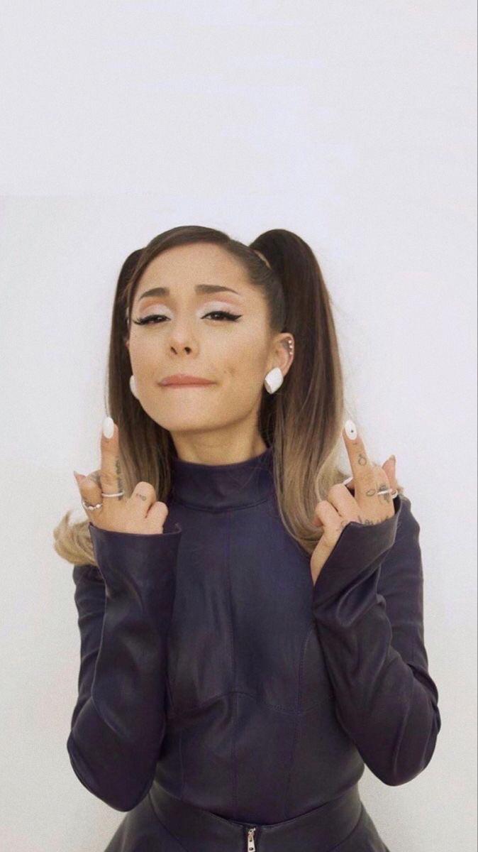 I want Ariana Grande to peg me, ruining me over and over as punishment for not being able to satisfy her