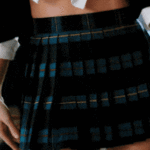 Megan Fox schoolgirl outfit in TMNT 2