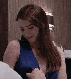 Emma Roberts giving a little moan as her hard nipples gets pinched in American Horror Story