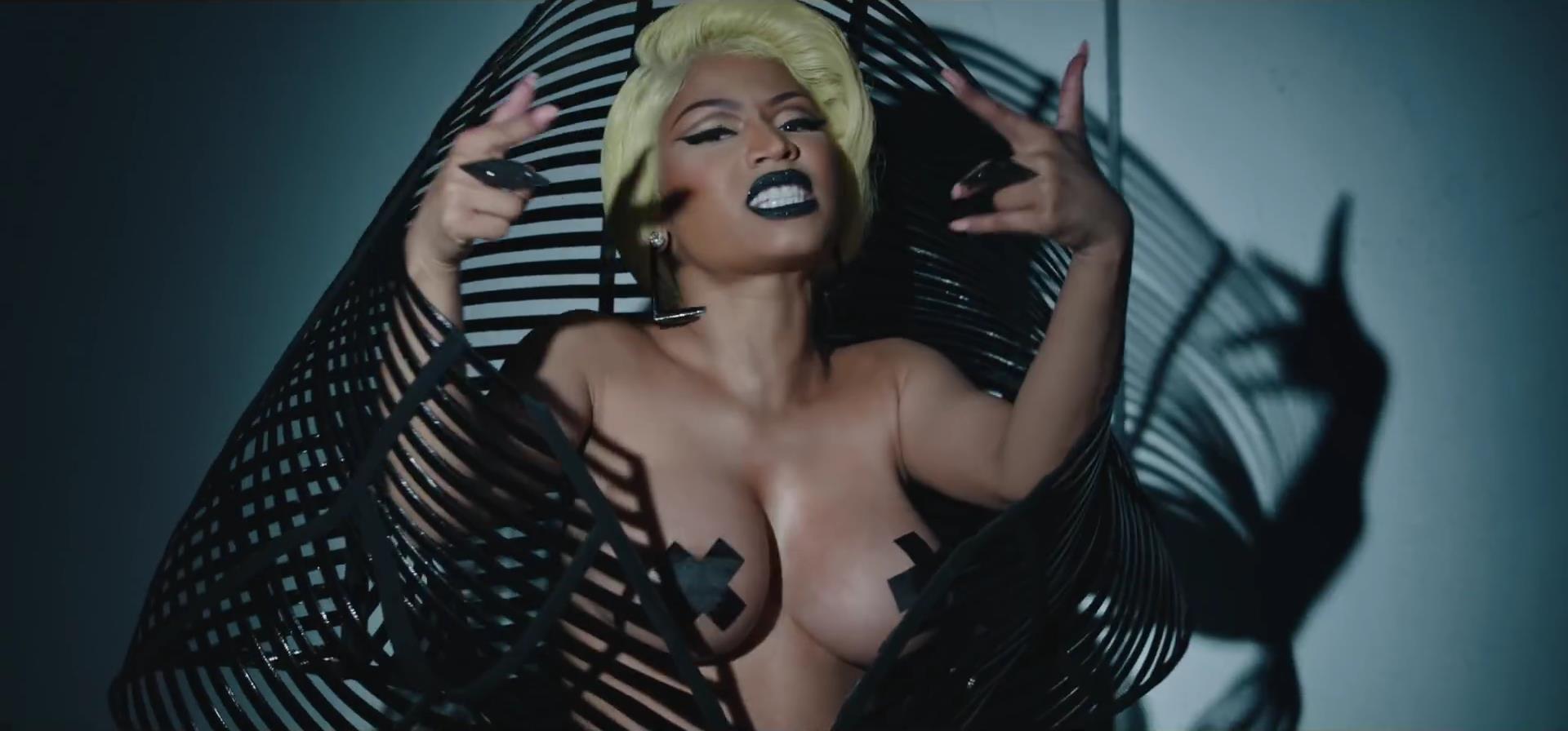 Gangsta nicki Minaj showing off her big fake tits