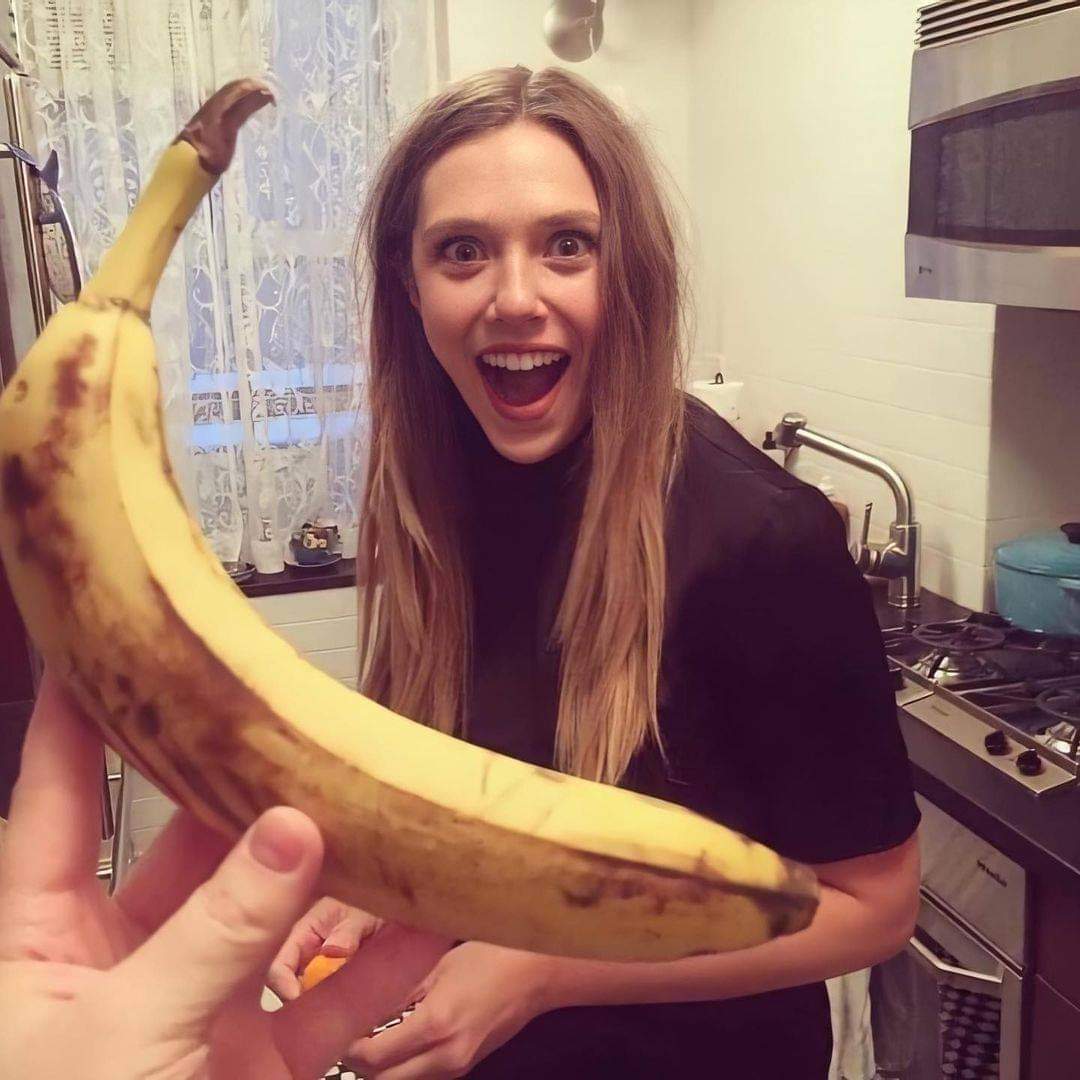 Elizabeth Olsen is vary happy to have something to shove