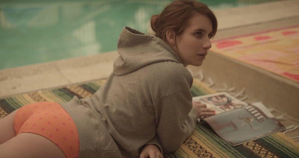 Emma Roberts in orange