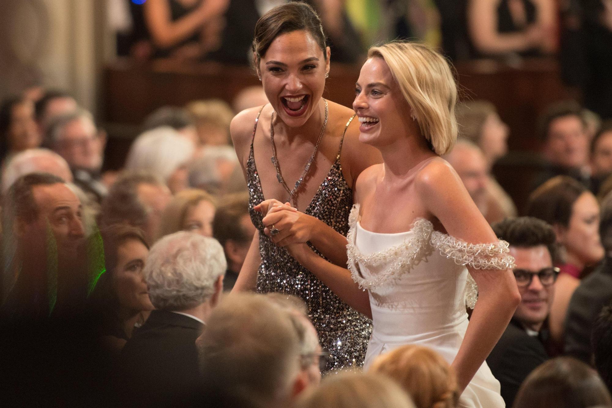 Gal Gadot and Margot Robbie laughing after seeing your dick