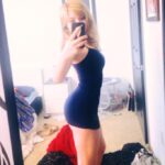 Jennette McCurdy arching her back