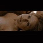 Alice Eve topless plots in Crossing Over
