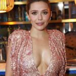 Where does Elizabeth Olsen earn your load? Face or Tits?