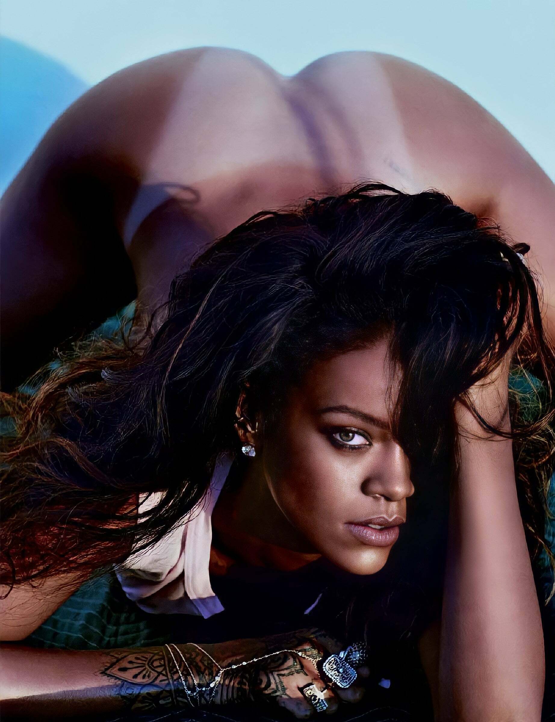 The photographer probably saved the reverse angle of this Rihanna pose for himself